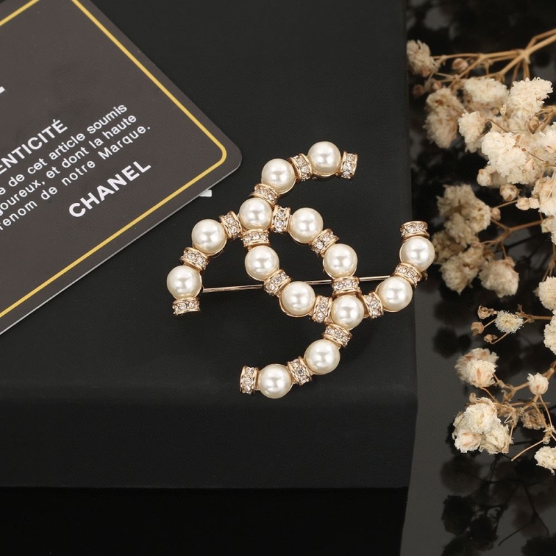 Ch*el brooches